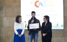 Foto de Eloy recogiendo en premio durante el congreso